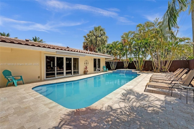 view of pool featuring a patio