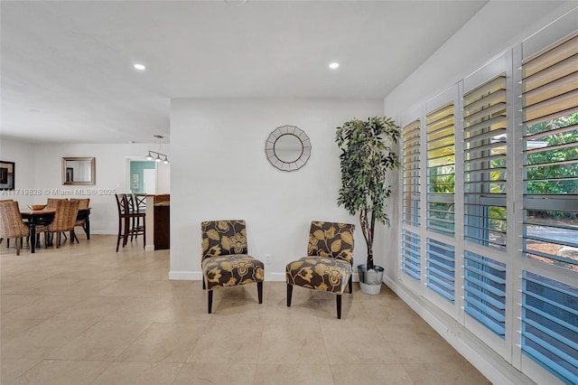 sitting room featuring light tile patterned floors