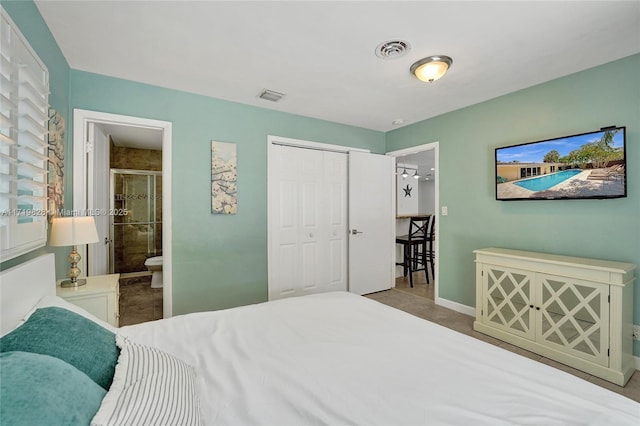 bedroom with connected bathroom and a closet