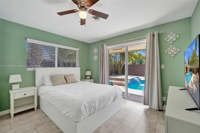 bedroom featuring light tile patterned flooring, ceiling fan, and access to exterior