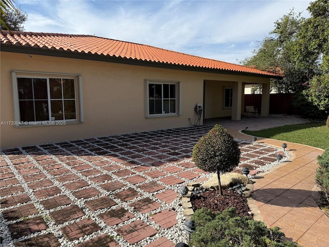 rear view of property with a patio area