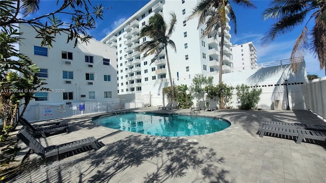 view of swimming pool featuring a patio