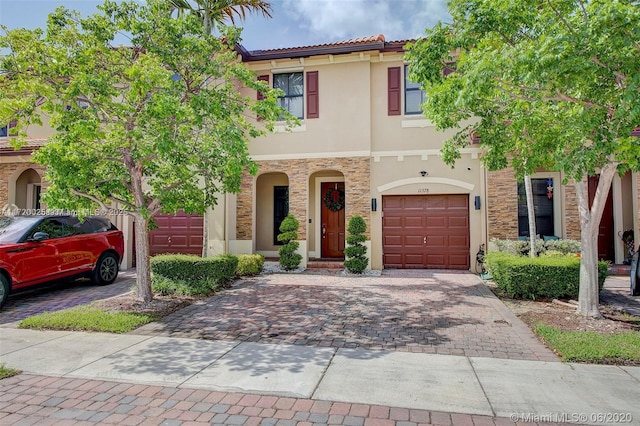 view of front of property featuring a garage