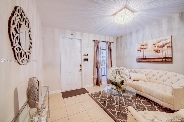 living room with light tile patterned flooring and a chandelier