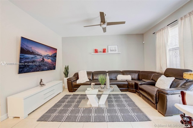 living room featuring tile patterned flooring and ceiling fan