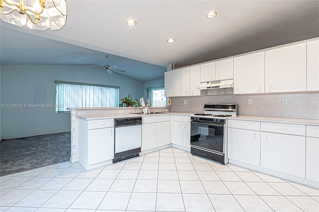 kitchen featuring white cabinetry, dishwasher, range with gas cooktop, kitchen peninsula, and vaulted ceiling