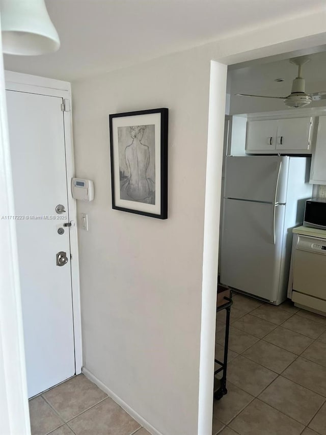 1301 NE Miami Gardens Dr Unit 1024W, Miami, FL 33179 - entrance foyer featuring light tile patterned floors and a ceiling fan