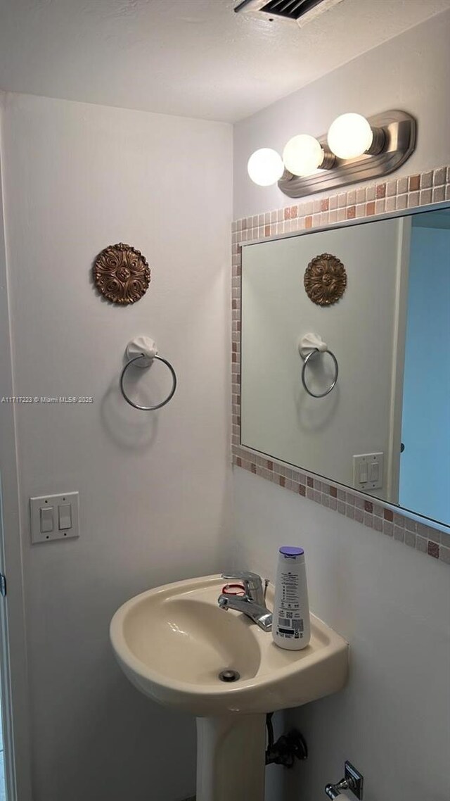 1301 NE Miami Gardens Dr Unit 1024W, Miami, FL 33179 - bathroom featuring a sink
