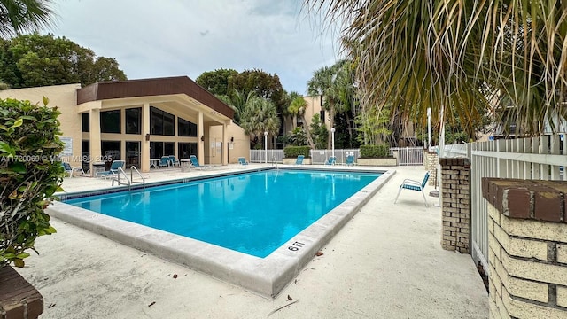 view of pool featuring a patio