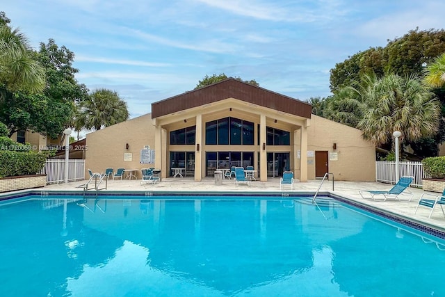 view of pool featuring a patio