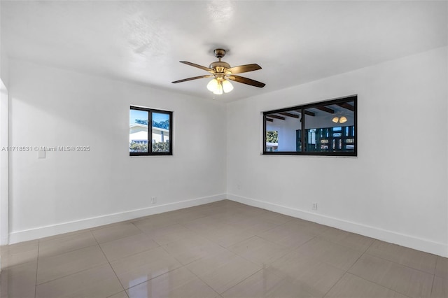 unfurnished room featuring ceiling fan