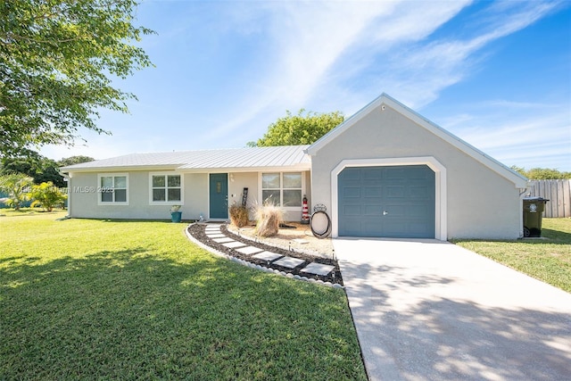 single story home with a garage and a front lawn