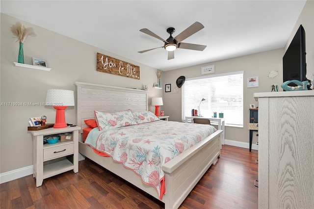 bedroom with dark hardwood / wood-style floors and ceiling fan