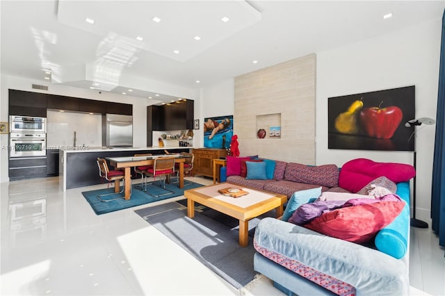 living room featuring light tile patterned floors