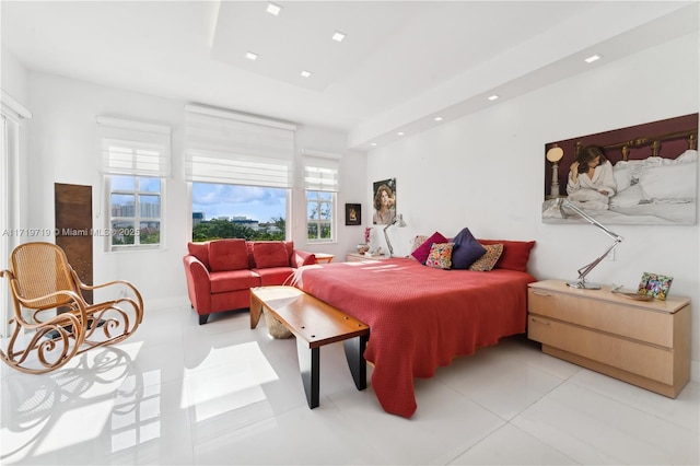 bedroom featuring light tile patterned flooring