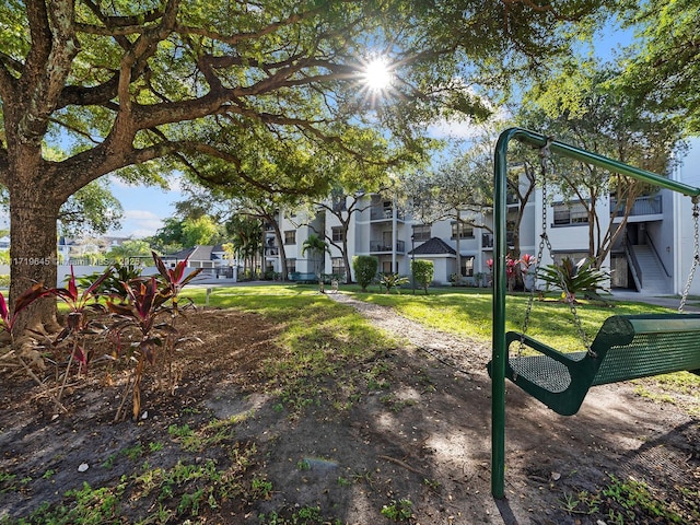 view of community featuring a lawn