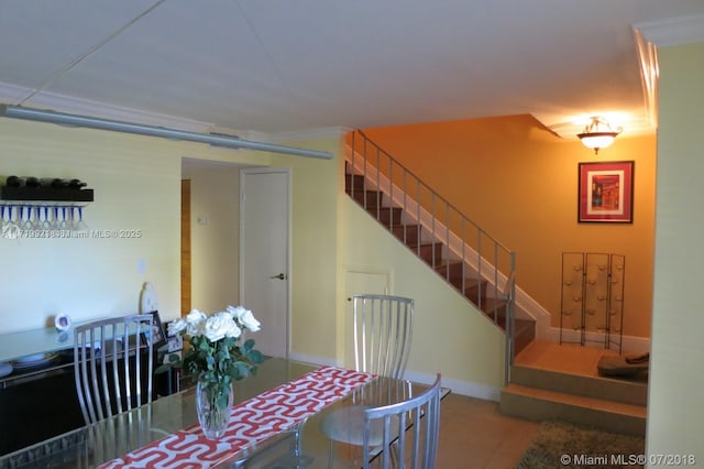 dining room with tile patterned flooring