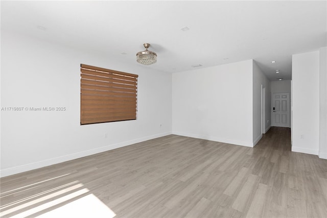 empty room featuring light hardwood / wood-style flooring