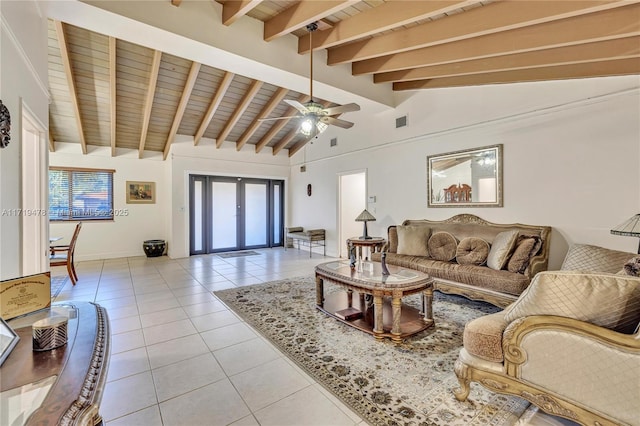 living room with ceiling fan, french doors, wooden ceiling, lofted ceiling with beams, and light tile patterned floors