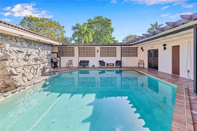 view of pool with a patio area