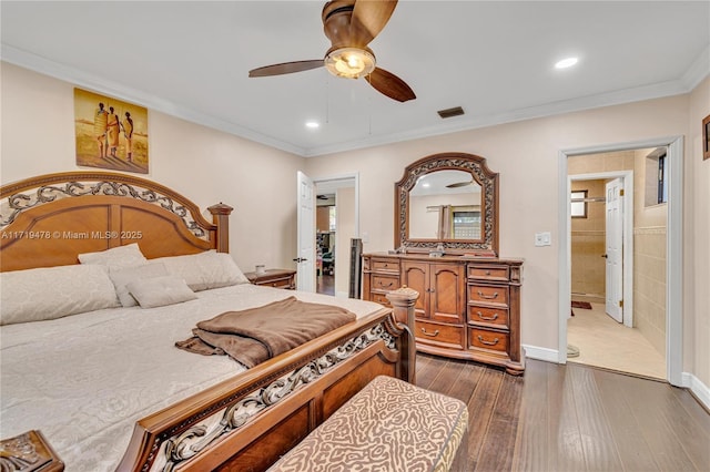 bedroom with ceiling fan, dark hardwood / wood-style flooring, and crown molding