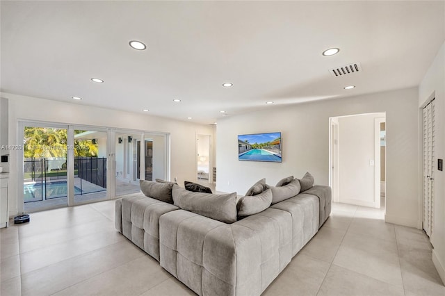 tiled living room with french doors