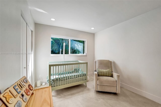 bedroom featuring a crib