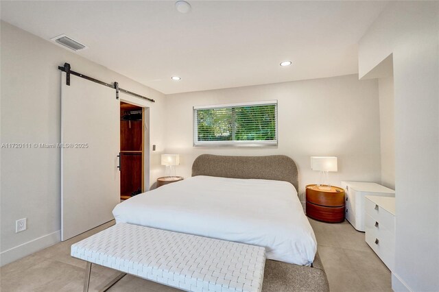 bedroom with a barn door