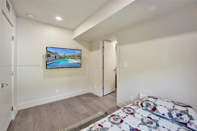 unfurnished bedroom with light hardwood / wood-style floors