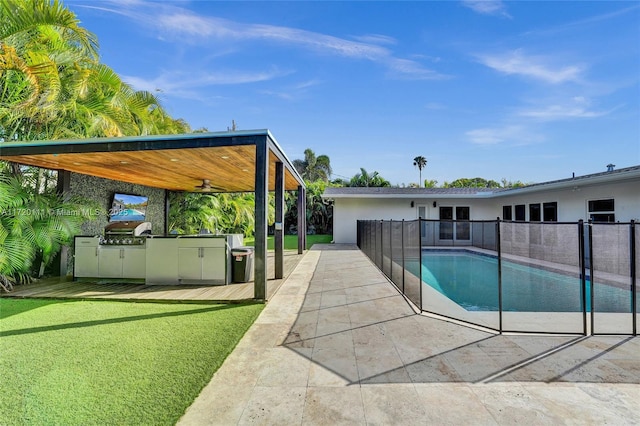 view of pool featuring ceiling fan, a yard, grilling area, area for grilling, and a patio