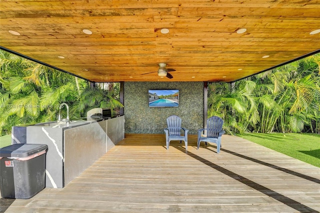 view of patio / terrace featuring area for grilling, a wooden deck, and ceiling fan