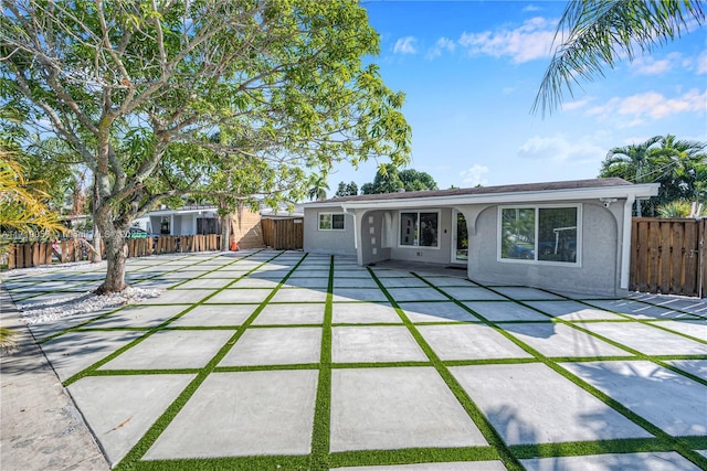 back of house with a patio area