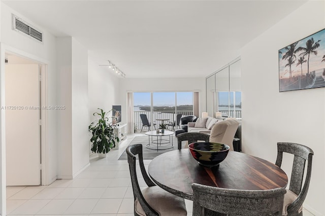 view of tiled dining space