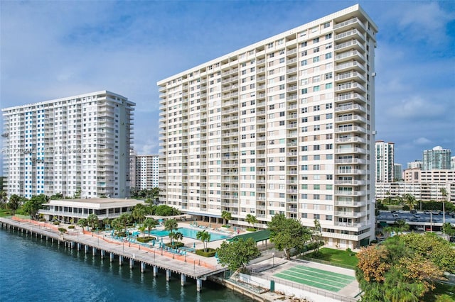 view of building exterior with a water view