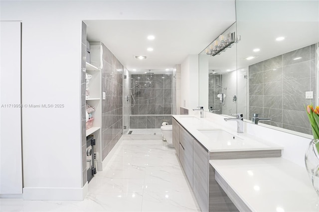 bathroom featuring an enclosed shower, vanity, and toilet