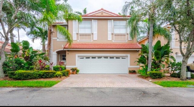 view of front of property featuring a garage