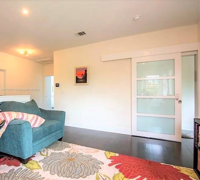 living room featuring dark hardwood / wood-style flooring