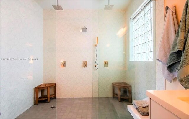 bathroom with vanity and walk in shower