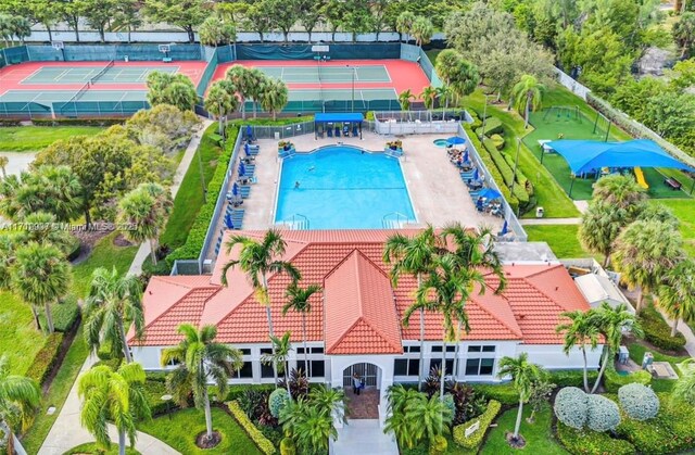 view of swimming pool with a patio