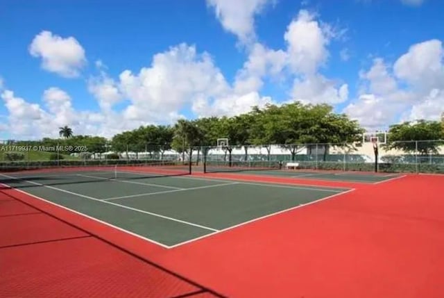 view of sport court featuring basketball hoop