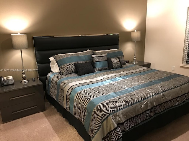 bedroom featuring light colored carpet