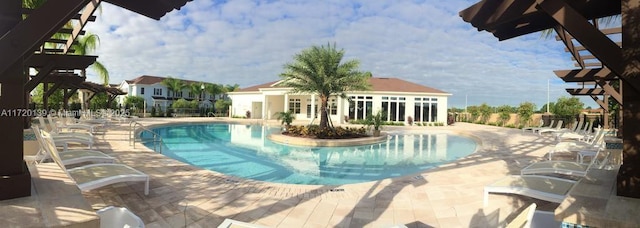 view of pool featuring a patio