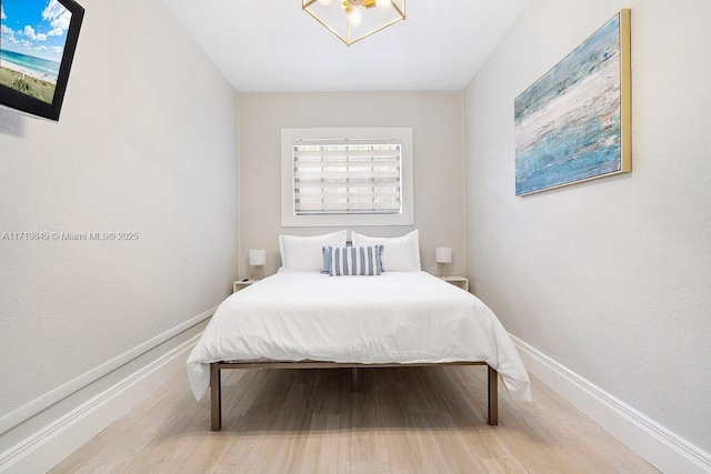 bedroom featuring hardwood / wood-style floors