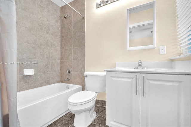 full bathroom featuring vanity, shower / bath combination with curtain, tile patterned floors, and toilet