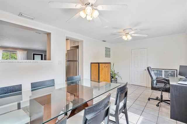 dining area featuring ornamental molding, light tile patterned flooring, ceiling fan, and visible vents