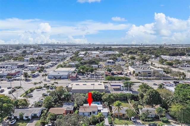 birds eye view of property with a residential view