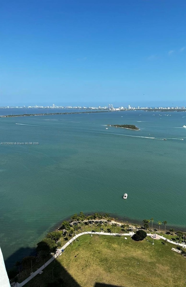 drone / aerial view featuring a water view