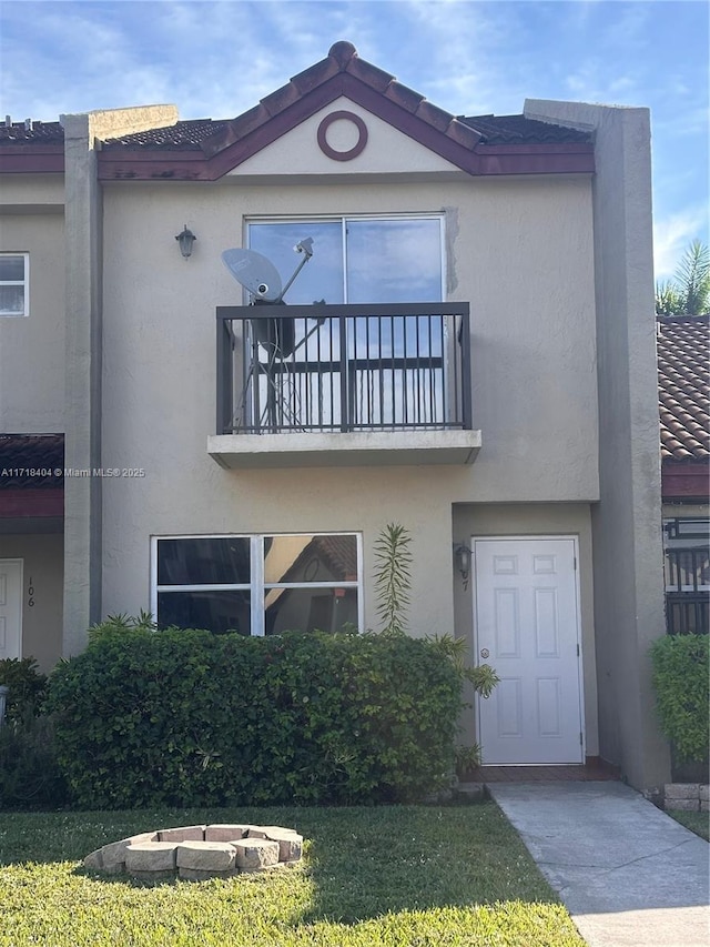 6435 SW 129th Pl Unit 107, Miami, FL 33183 - view of front facade featuring a balcony