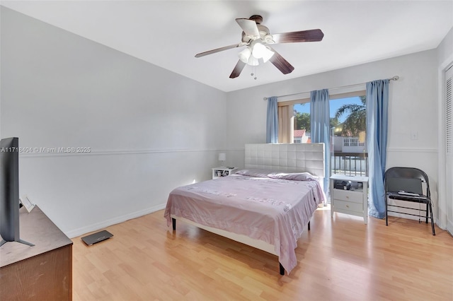 bedroom with ceiling fan and light hardwood / wood-style floors