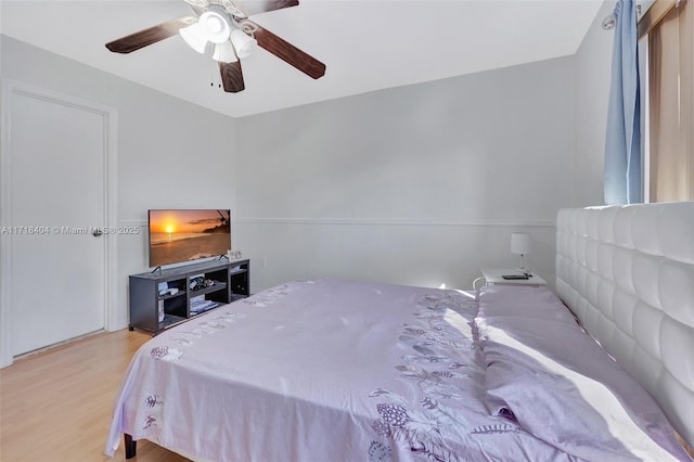 bedroom featuring ceiling fan and light hardwood / wood-style floors